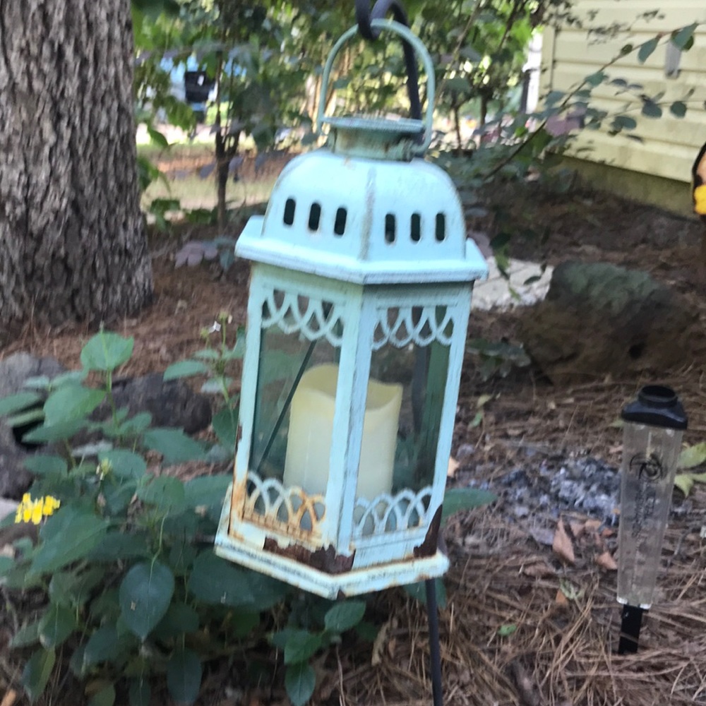 Solar powered yard lantern